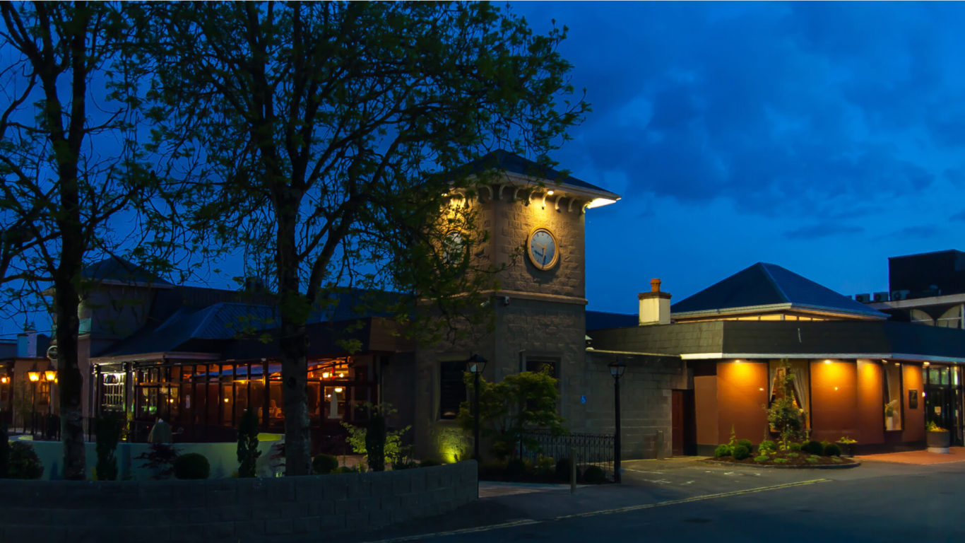 treacys-west-county-exteriro-nighttime-clocktower-01